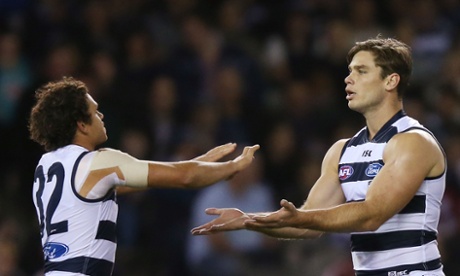 Tom Hawkins and Steven Motlop celebrate a goal in Geelong’s 77-point win (Michael Dodge/Getty Images)