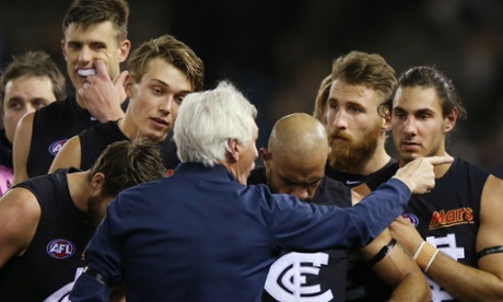 Carlton coach Mick Malthouse, possibly pointing towards the Etihad Stadium exit