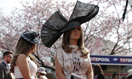 Big hats go on display during Ladies' Day at the Grand National last month.
