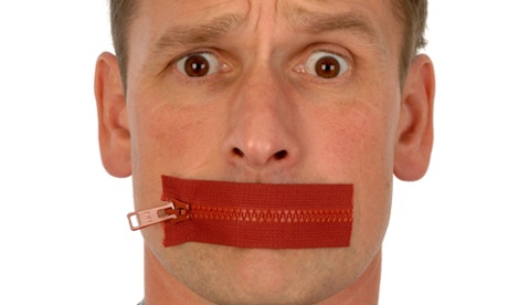 Man with a zip across his mouth. Image shot 09/2005.