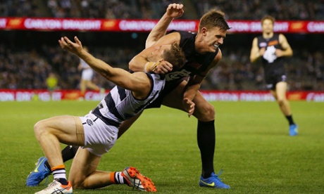 Cameron Wood tangles with Joel Selwood (Michael Dodge/Getty Images)