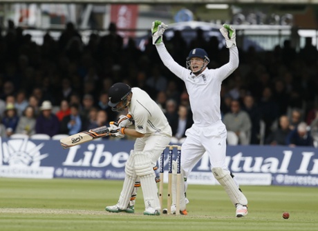 England's wicketkeeper Jos Buttler celebrates the raising of the umpire's finger to give out New Zealand's Tom Latham LBW courtesy of the bowling of Moeen Ali.
