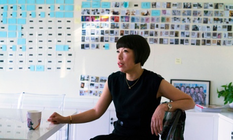 Angelica Cheung, editor-in-chief of Vogue China (right) discusses editorial issues with Daniela Paudice, fashion director, in her office in Beijing.