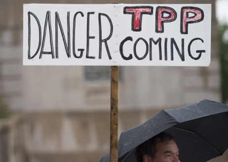 Demonstrators march in Washington DC to protest against the Trans-Pacific Partnership.
