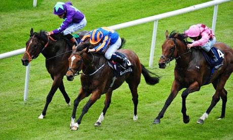 Gleneagles and Ryan Moore winning the Irish 2,000 Guineas at The Curragh from Endless Drama