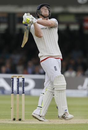 England's Ben Stokes watches as he gets a 4 off the bowling of New Zealand's Tim Southee.