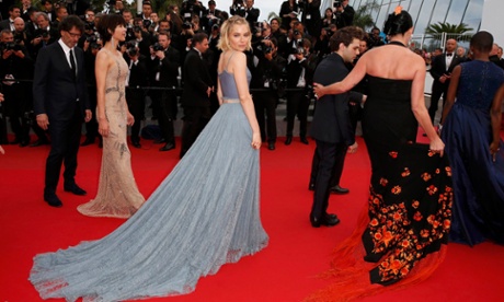 Jury member actress Sienna Miller (C) and jury members pose on the red carpet as they arrive at the closing ceremony of the 68th Cannes Film Festival in Cannes, southern France, May 24, 2015.        REUTERS/Benoit Tessier:rel:d:bm:LR2EB5O1AQFBF