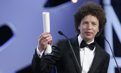 Director Michel Franco speaks after he was presented the Best Screenplay award for the film Chronic during the awards ceremony at the 68th international film festival, Cannes, southern France, Sunday, May 24, 2015. (AP Photo/Lionel Cironneau).