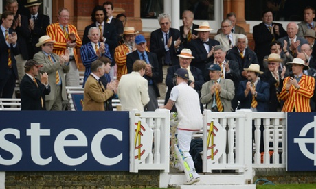 The applause continues as he makes his way through the MCC members to the pavillion.