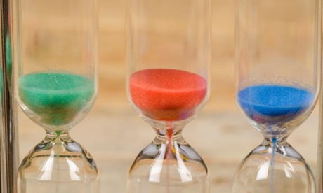Close up of egg timers with coloured sand