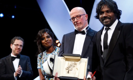 Jacques Audiard with the stars of Dheepan, Kalieaswari Srinivasan and Jesuthasan Antonythasan, and joint jury chair Ethan Coen.