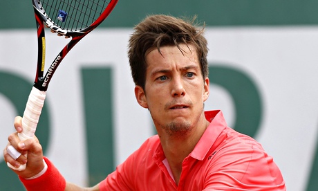 Aljaz Bedene of Great Britain in action at Roland Garros where he was beaten in four sets