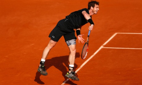 Andy Murray lets a serve fly on his way to winning the first set against Facundo Arguello of Argentina.