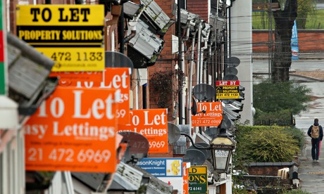 o Let and For Sale signs protrude from houses in the Selly Oak area of Birmingham