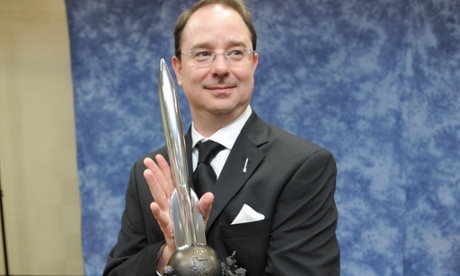 John Scalzi at the 2013 Hugo Awards ceremony after winning the best novel award for Redshirts.