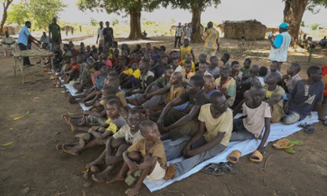 Former child soldiers wait to be released in Bambari, Central African Republic, in May as part of a UN-brokered deal.