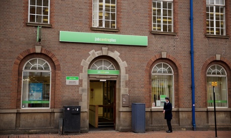 A girl standing outside a job centre plus.