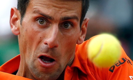 Novak Djokovic eyes the ball as he prepares to play a shot to Jarkko Nieminen.