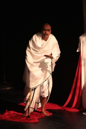 D'Lo as Gandhi.