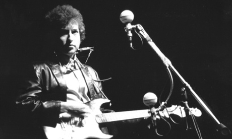 Bob Dylan goes electric at Newport folk festival in 1965.