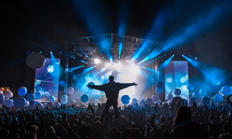 The crowd soaks up a set by Fatboy Slim at Bestival 2013