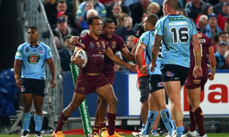 Will Chambers (left) and Justin Hodges celebrate Chambers' try as Michael Jennings, left, adopts his best 'Wha' happened?' face. Photo by Cameron Spencer/Getty Images.