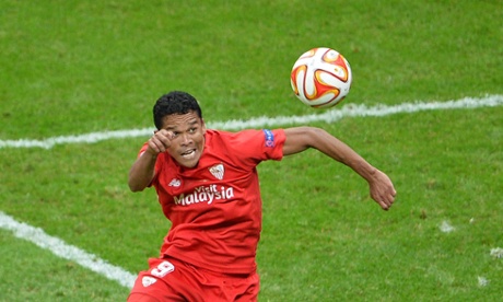 Sevilla's Carlos Bacca comes close to getting his hat-trick but is denied by the Dnipro keeper.