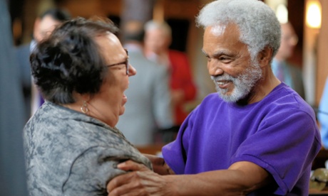 Neb. state Sen. Ernie Chambers, right, of Omaha, celebrates with Sen. Kathy Campbell, left, of Lincoln, after the one-house Legislature voted 30-19 to override Gov. Pete Ricketts, a Republican who supports the death penalty.