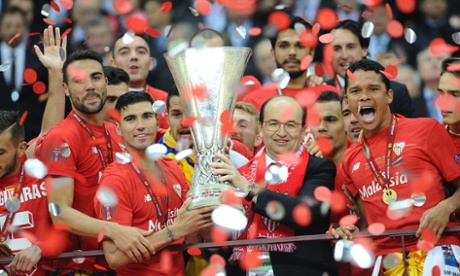 Sevilla Players celebrate with the trophy at the end of their 3-2 victor over FC Dnipro Dnipropetrovsk.