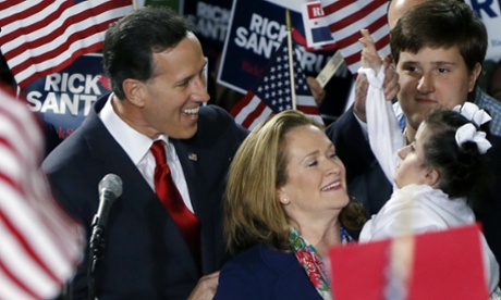 Rick Santorum, left, and his wife Karen, center, talk with his daughter Bella, right, as he announces his candidacy for the Republican nomination.