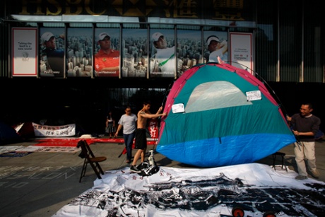 Protesters move a tent during the “Occupy Central” campaign, which began in October 2011.