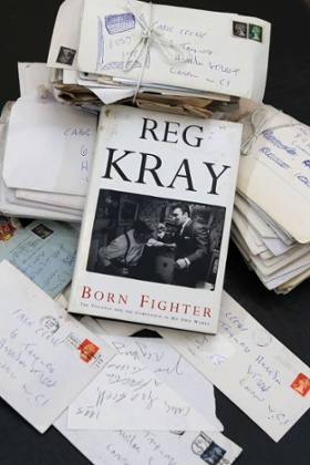A signed copy of Kray's autobiography Born Fighter and more than 200 letters he wrote, which are to go up for auction.