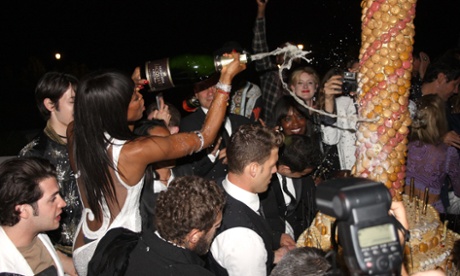 Naomi Campbell with friends and a large cake in France this week.