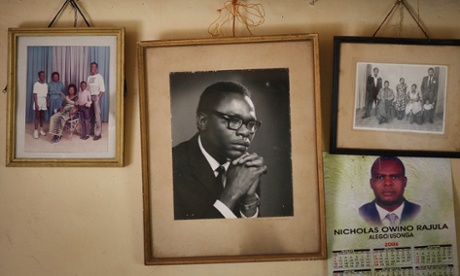 Family portraits, including one of Barack Obama's father (also called Barack) hang in Kogelo, western Kenya.