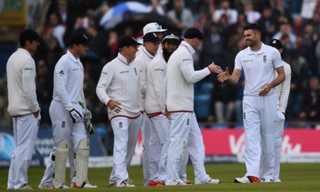 A hearty handshake for James Anderson as he is congratulated on taking his 400th Test wicket.