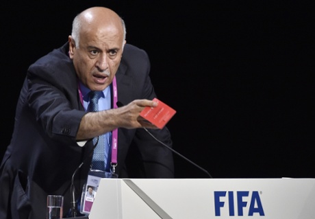President of the Palestinian FA, Jibril Rajoub ,shows a red card as he speaks during the Fifa Congress.