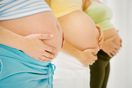 Three pregnant women