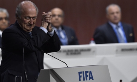 Sepp Blatter celebrates after his re-election as Fifa president.