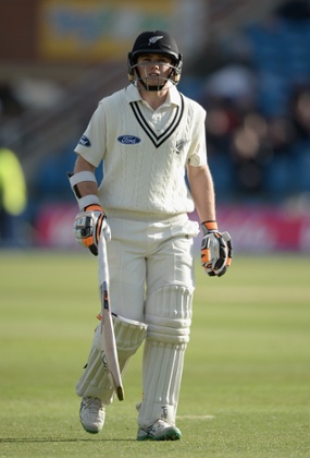 Tom Lathamleaves the field after being dismissed by Stuart Broad.