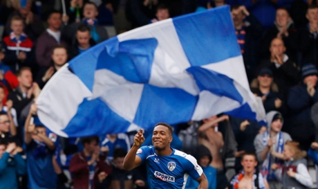 Dominic Poleon celebrates after scoring the first goal for Oldham.