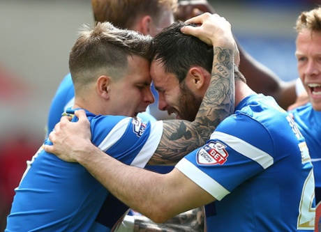 Chris Dagnall and Dean Cox celebrates scoring.