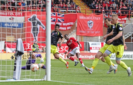 Kieran Agard scores their third goal.