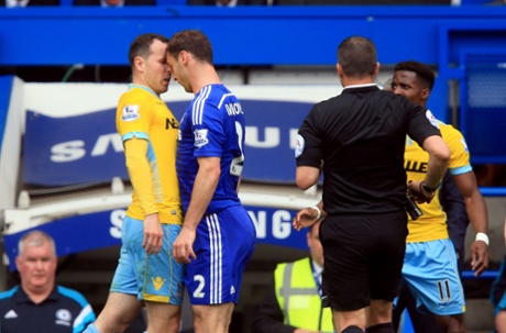 Jordon Mutch and Branislav Ivanovic confront each. other.