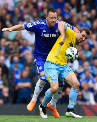 James McArthur tangles with John Terry.