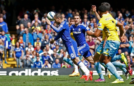 Hazard heads the return to score after his penalty was saved.