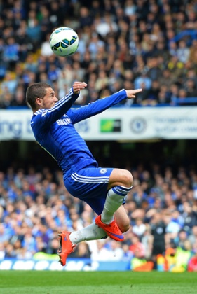 Eden Hazard controls the ball.