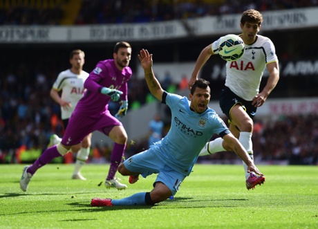 Aguero goes to ground after going past goalkeeper Hugo Lloris.