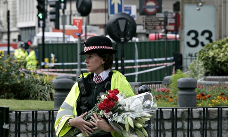 A policewoman at Aldgate tube station after the 2005 London bombings