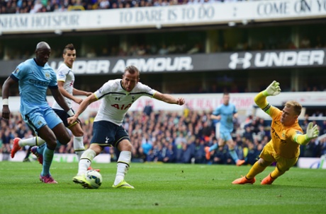 Harry Kane is foiled by goalkeeper Joe Hart.