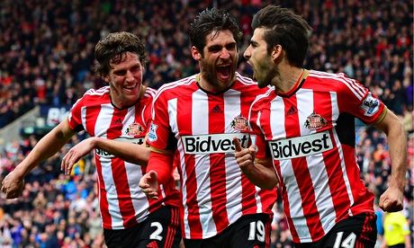 Jordi Gomez, centre, is congratulated by Bily Jones and Danny Graham